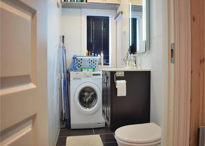 Three-bedroom In Hébergement de vacances *